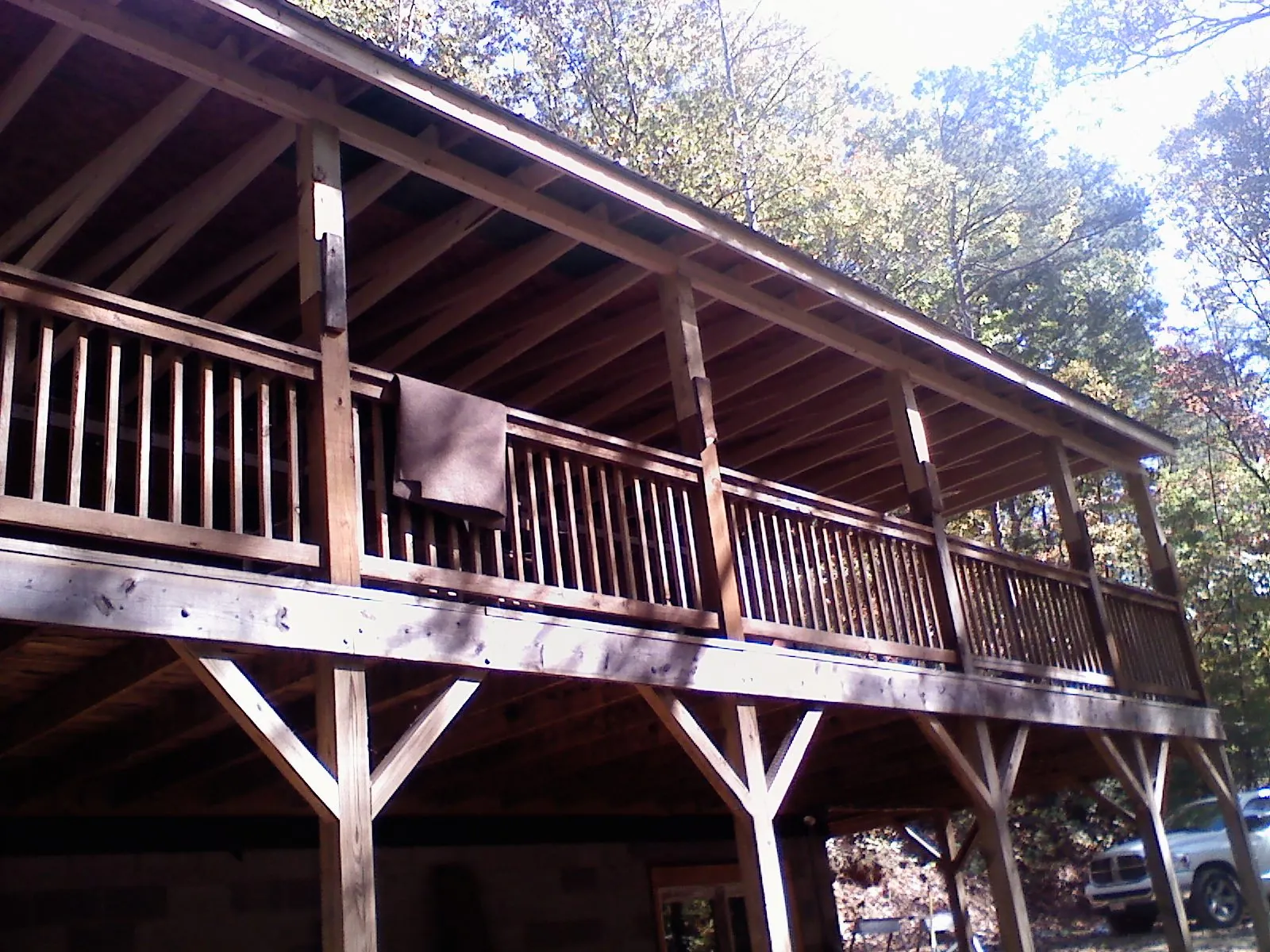 Timber framing under a new elevated porch and deck — Roof Leak Repair in Grasston by Roofing Brothers